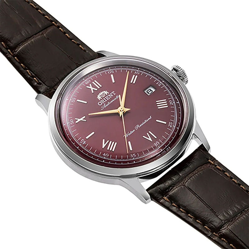 Orient Bambino Automatic RA-AC0026R30B - bordowa tarcza ze szlifem słonecznym i złotymi cyframi rzymskimi