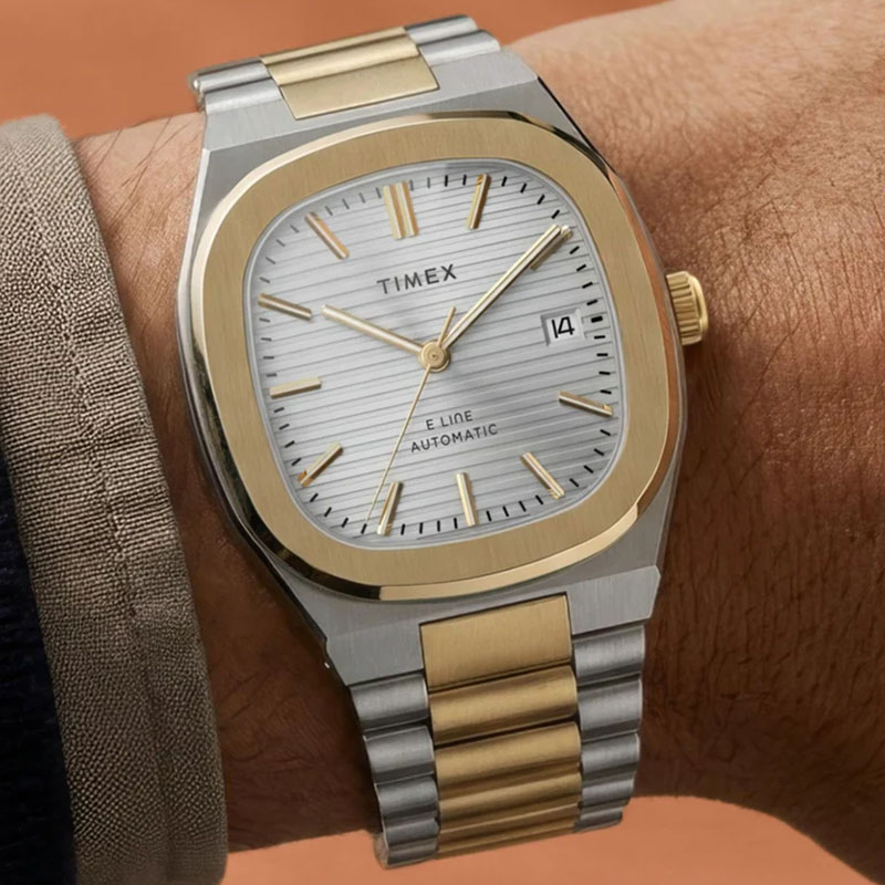 Timex E Line Automatic TW6A00600 – srebrny cyferblat ze złocistymi indeksami i datownikiem