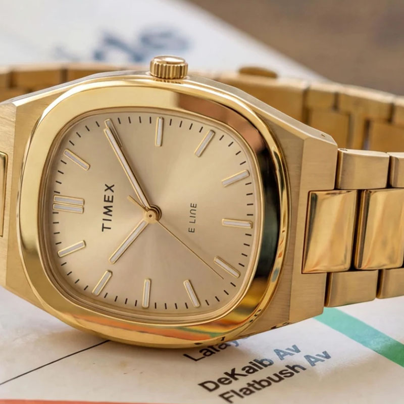 Timex E Line Quartz TW6A00900 – zegarek kwarcowy z kwadratową kopertą i szampańską tarczą