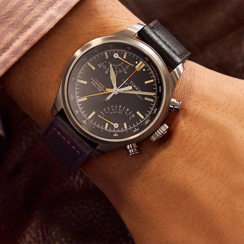 Timex Waterbury Ace Fly Back Chronograph TW2Y70000 - czarna tarcza z pomarańczowymi akcentami na nadgarstku
