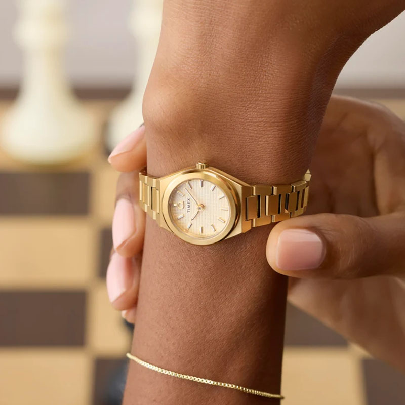 Timex Q Timex Continental Mini TW2Y68300 - zegarek z szampańską tarczą na nadgarstku